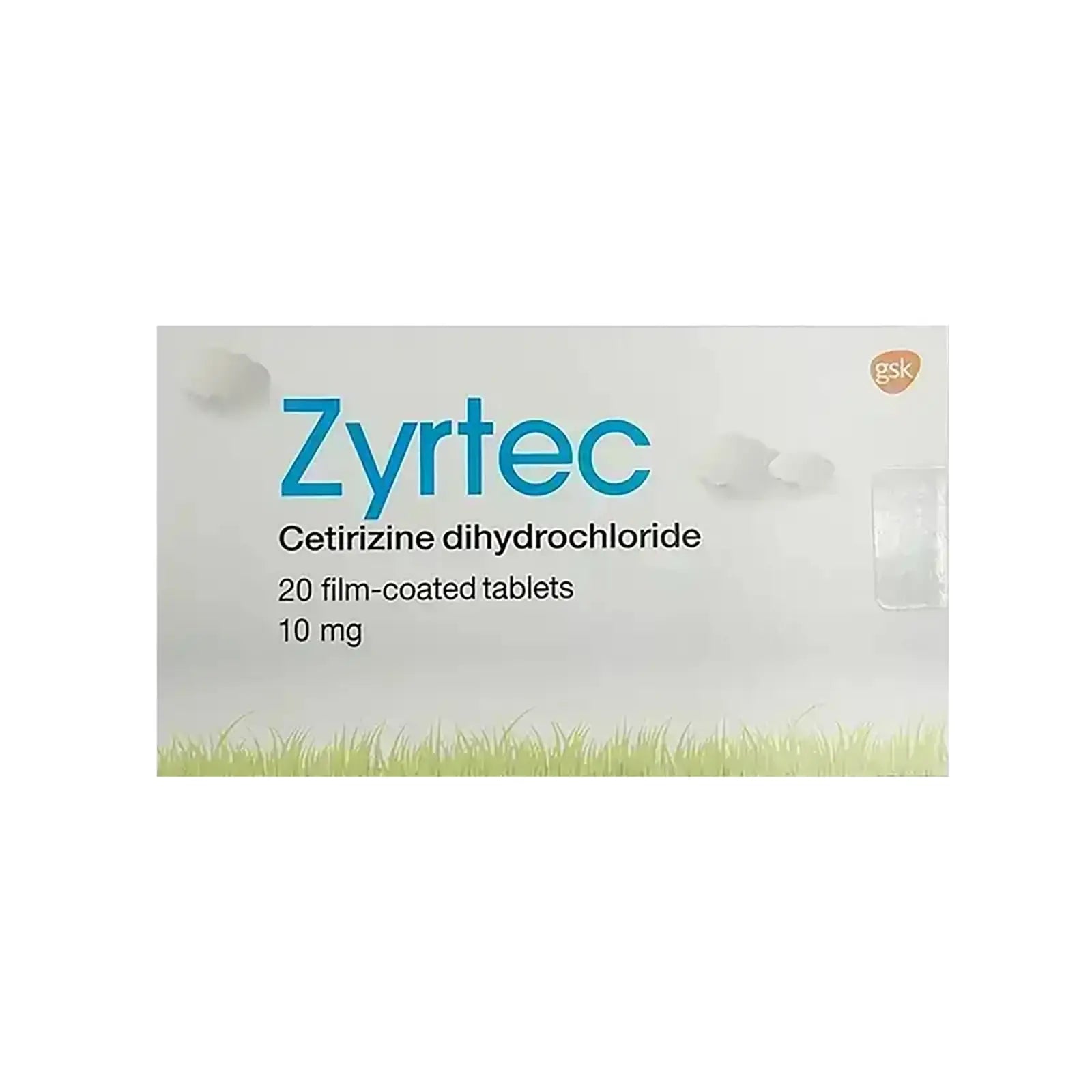 Zyrtec medication packaging with grass design on a white background